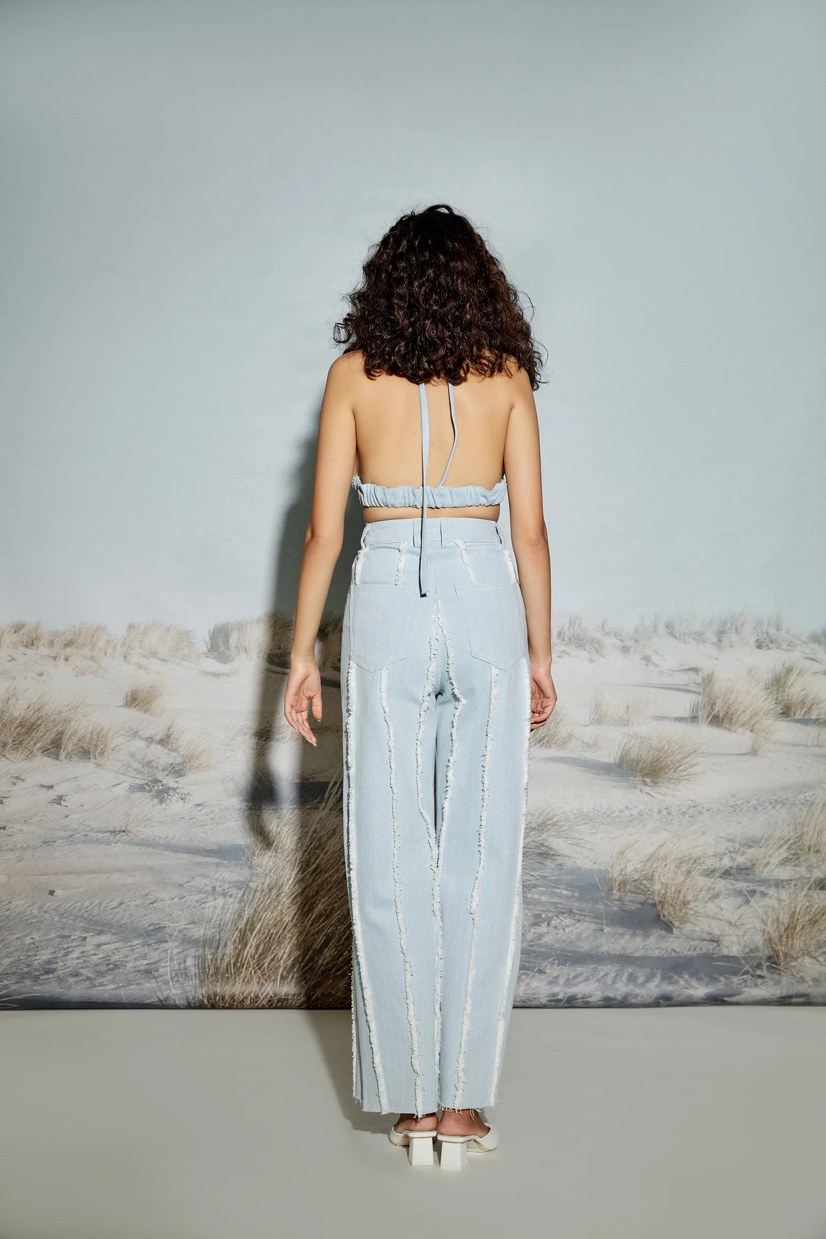Paneled Denim Jeans with Raw Seams and Side Slit - Image 5